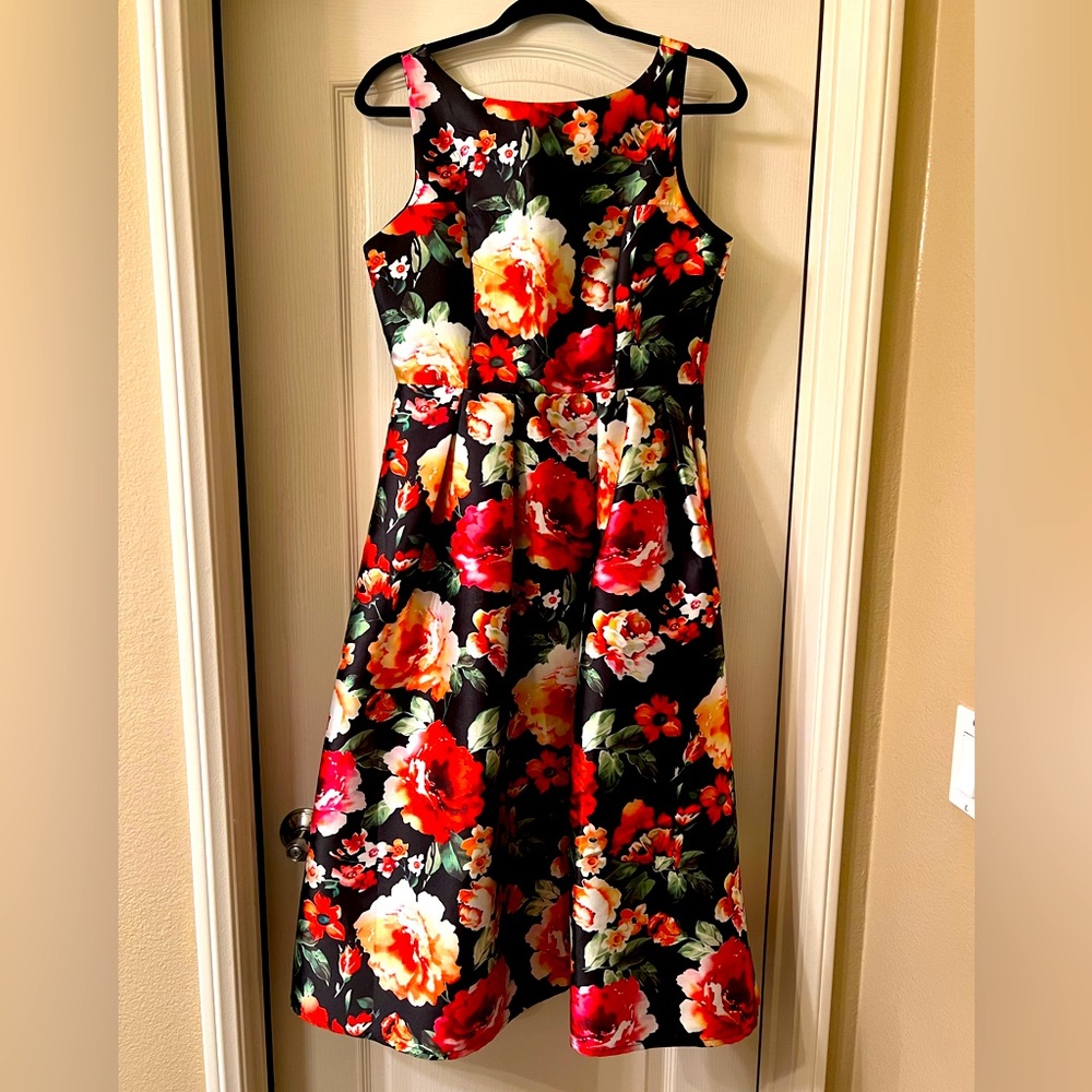 Size large floral party/cocktail dress. Minimal wear great condition.